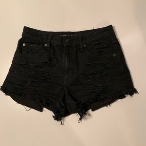 Black ripped shorts